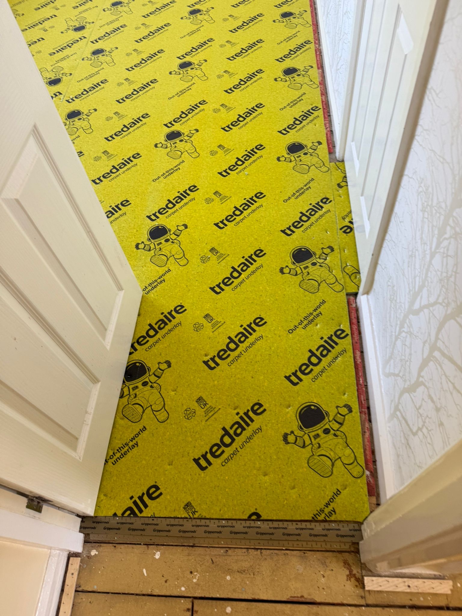 Underlay fitted in a hallway before carpet